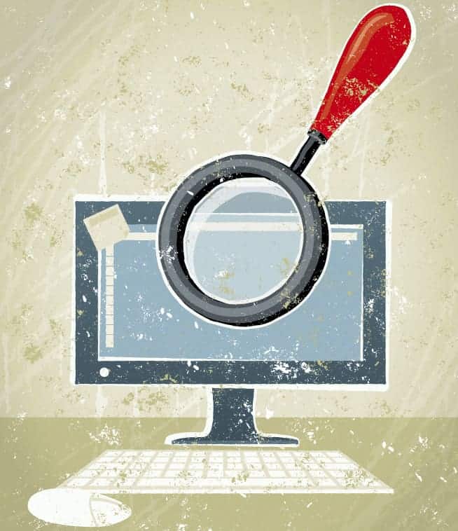 Illustration of a computer screen and a magnifying glass