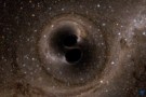 Simuloitu kuva kahden mustan aukon törmäyksestä