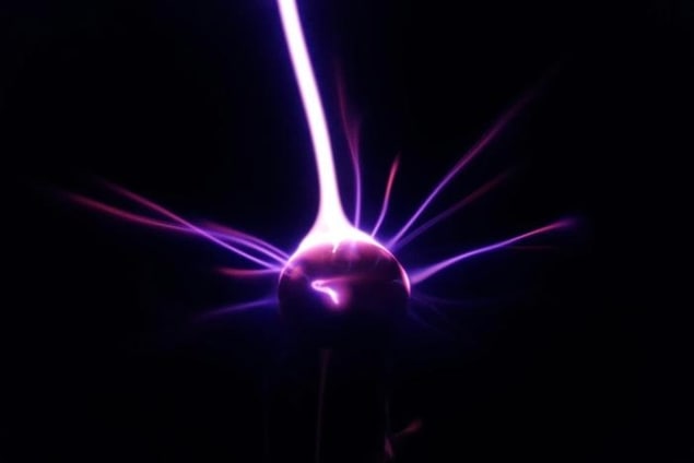 Artist's impression of the experiment, which resembles a glowing purple ball radiating purple spikes as if it were in motion